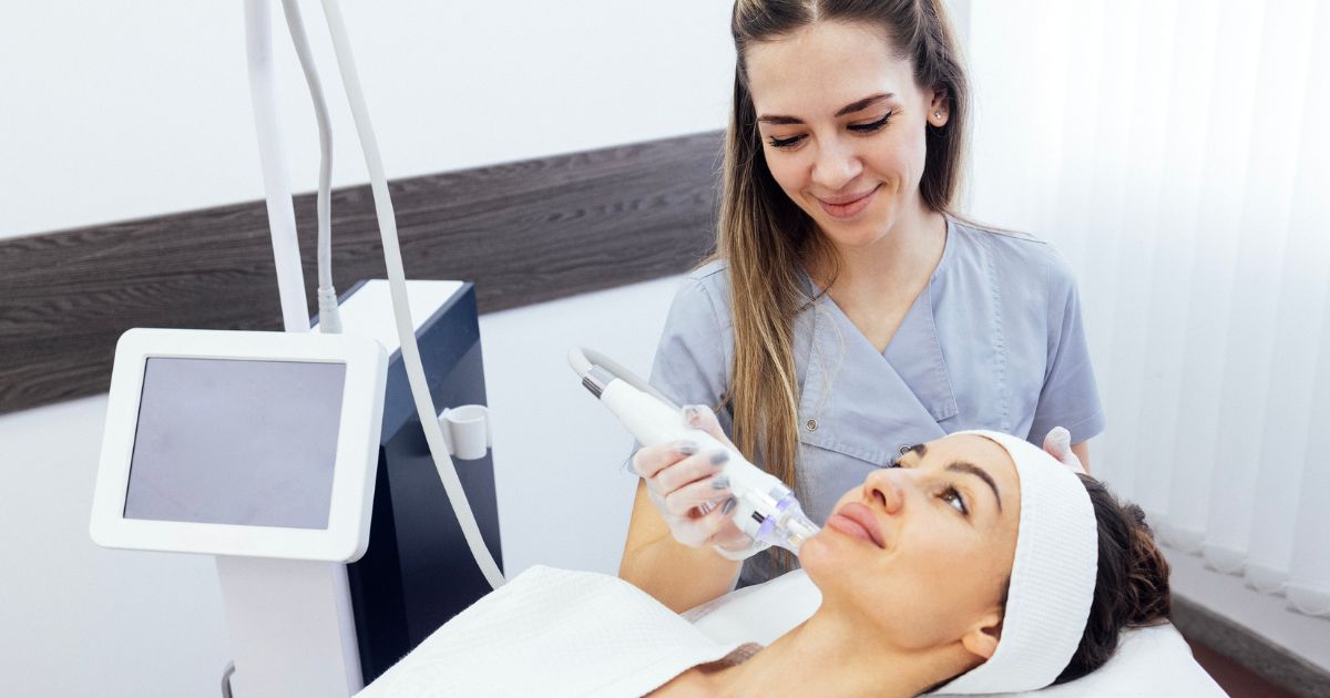 a woman having microneedling treatment