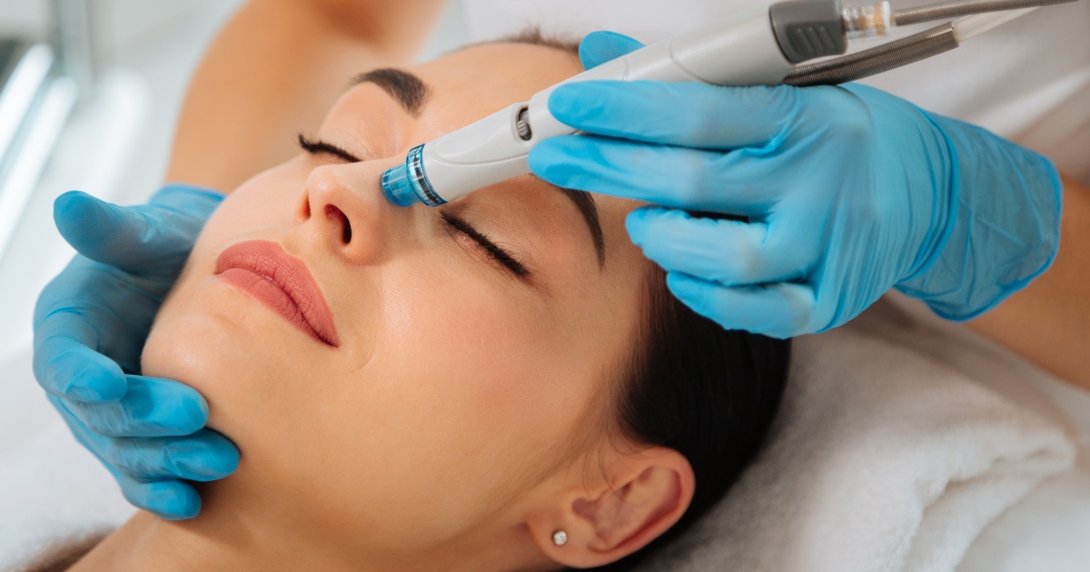 A woman getting hydrafacial.